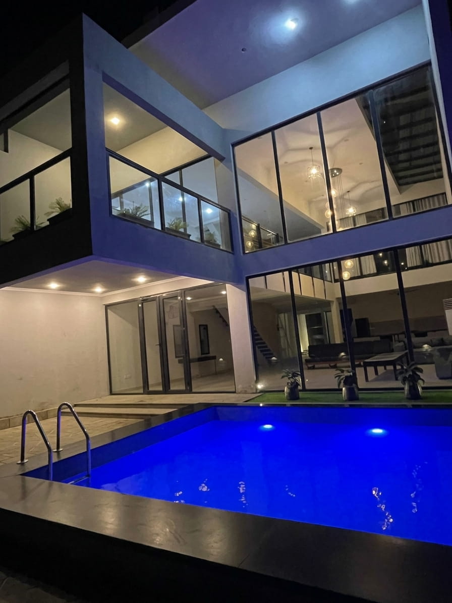 Beach Hut Loft 59 swimming pool and exterior at night